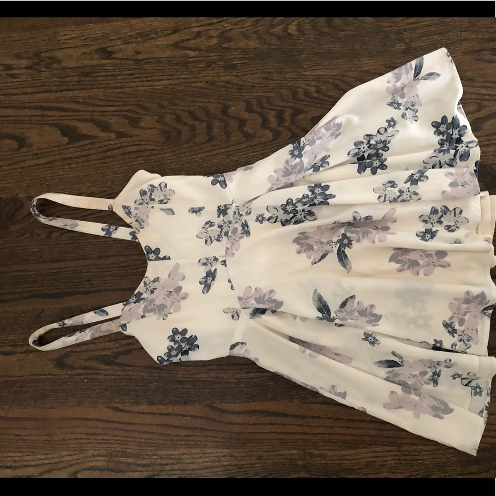 Cute off white mini dress with flower design